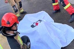 مرگ هولناک کارگر جوان زیر دستگاه غلطک آسفالت کاری